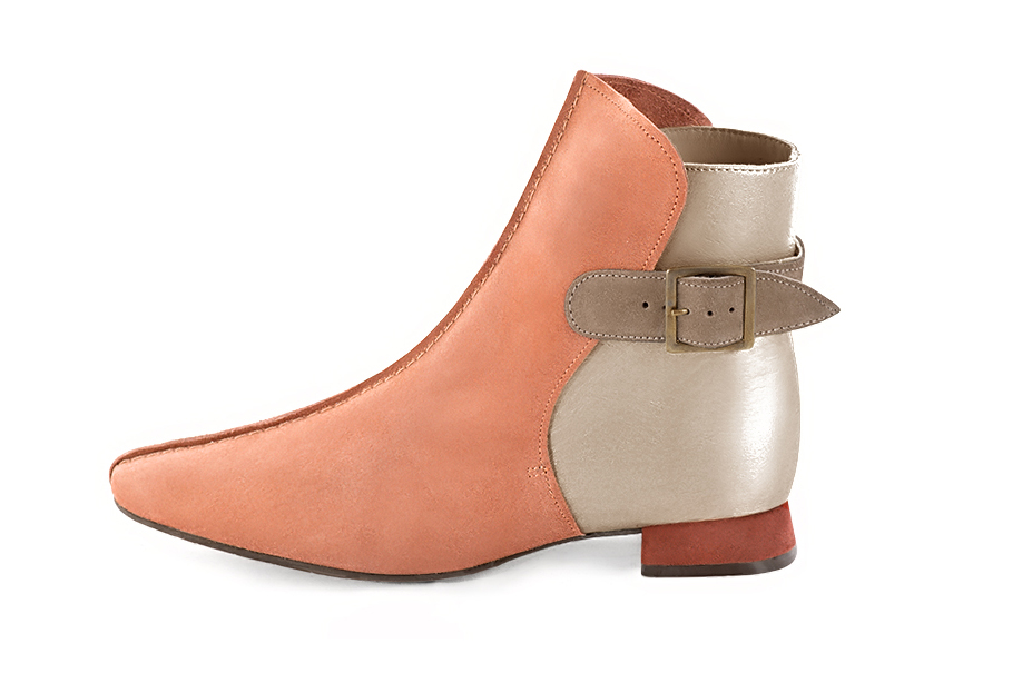 Peach orange, gold and tan beige women's ankle boots with buckles at the back. Square toe. Flat flare heels. Profile view - Florence KOOIJMAN